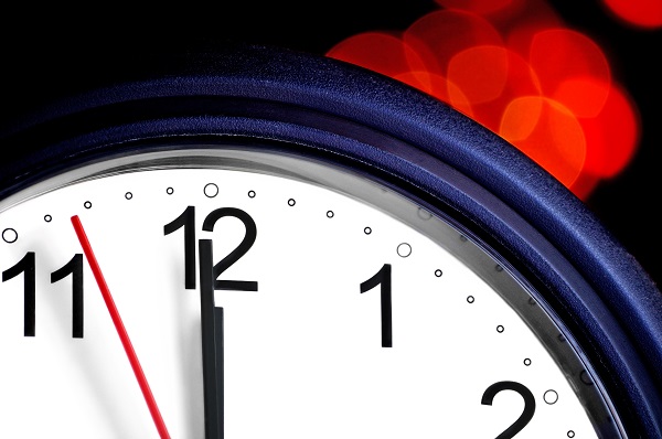 Office clock about to show midnight - few seconds to New Year