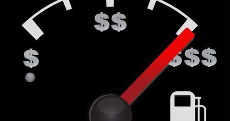 Gas gauge of a car with dollar symbols